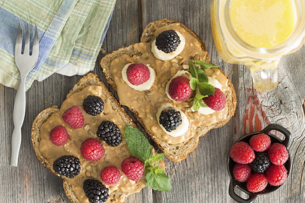 Peanut butter sandwiches with berries and cheese