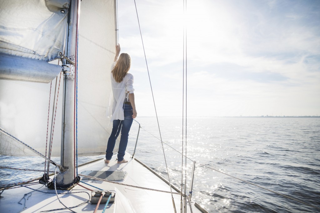 woman staying on sailboat