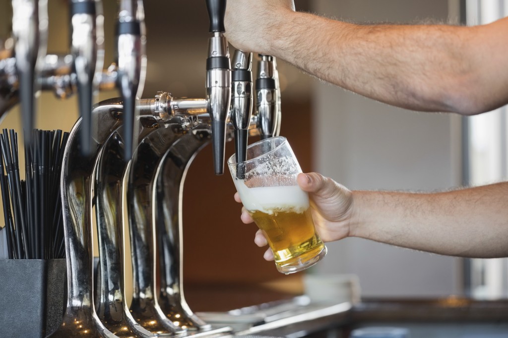 Barman Pulling A Pint of Beer - iStock_000044003752_Double