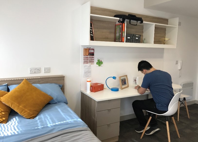 student studying in cityblock room