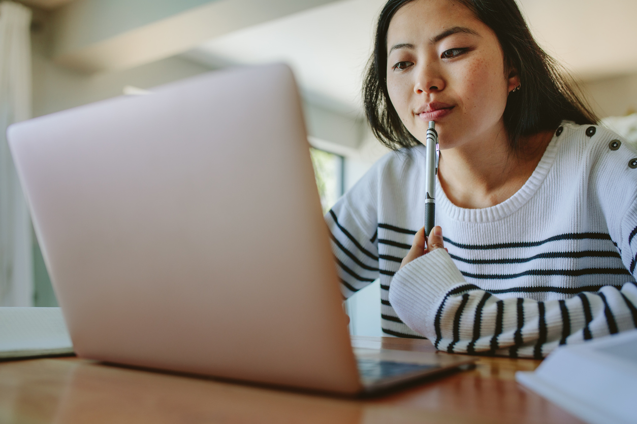 studying at home using laptop