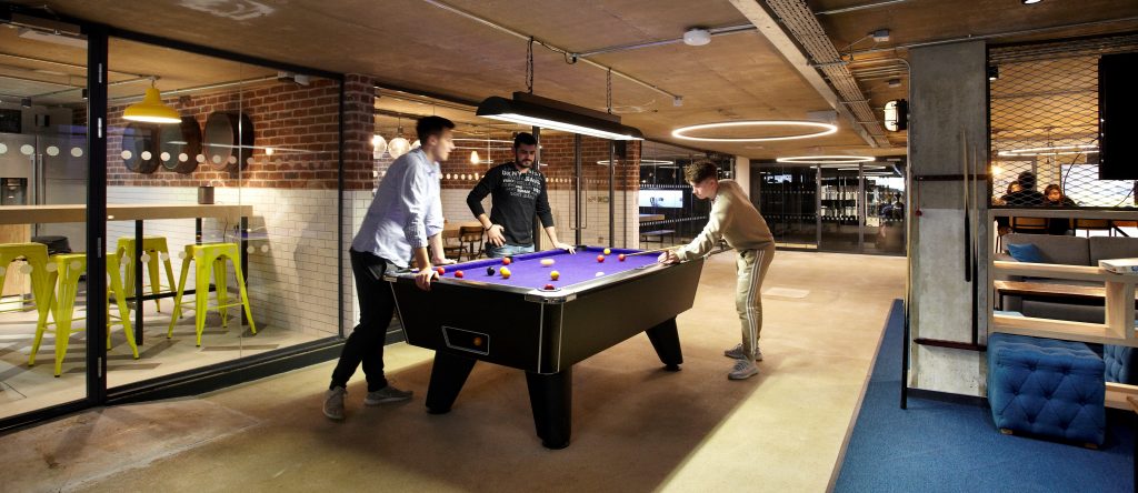 CityBlock Reading residents playing pool in the communal space