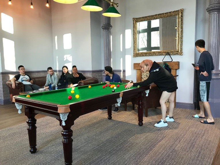 cityblock residents playing pool together