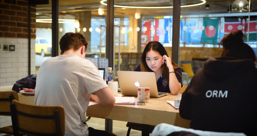 cityblock residents studying in communal area