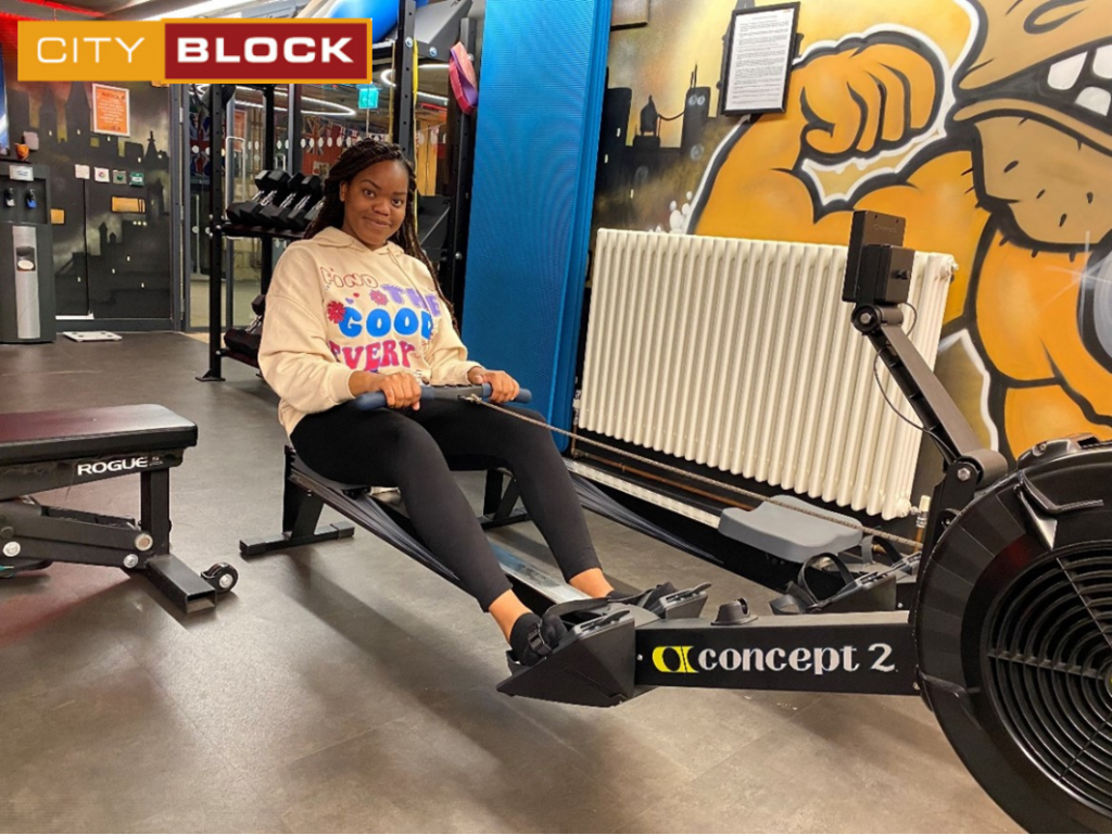 University student doing workout at the gym