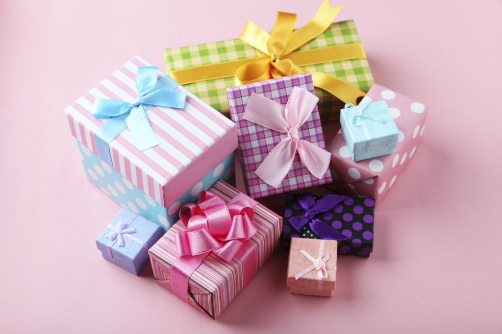 Beautiful gift boxes on pink background