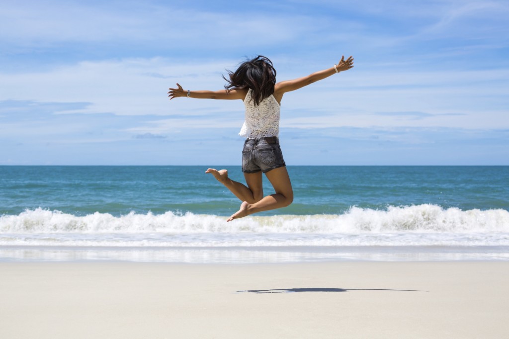 jumping on beach