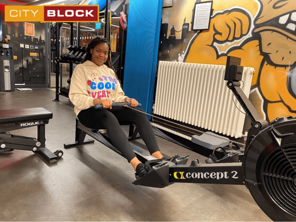 University student doing workout at the gym